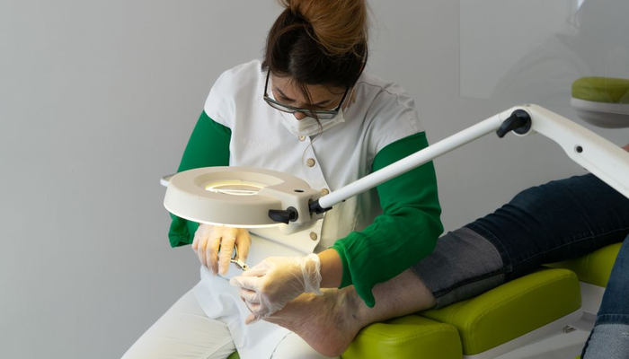 Senior receiving professional nail care